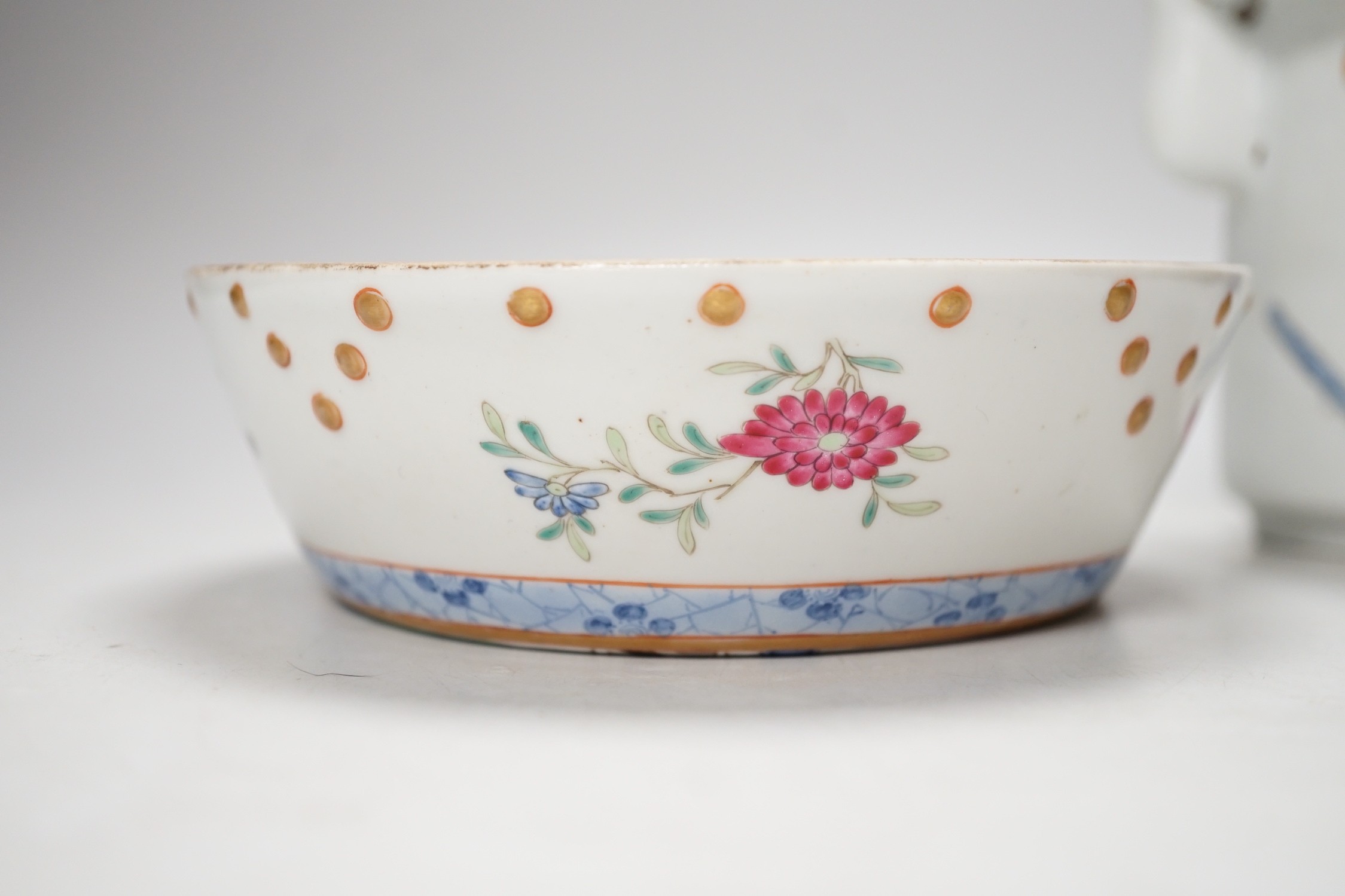 A Chinese famille rose teapot and a cover, together with a similar dish. 12cm tall